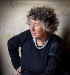 Old woman weathers the storm.