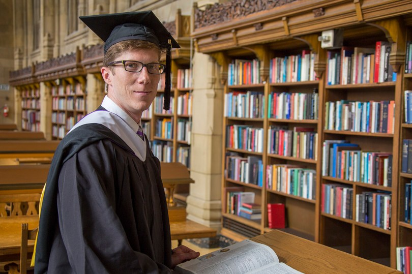 Ryan among the books.